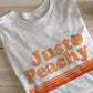 “JUST PEACHY” GRAPHIC TEE