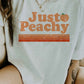 “JUST PEACHY” GRAPHIC TEE