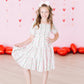 Rosebud Bows Smocked Ruffle Dress