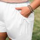 White Bow Decor Pockets Plus Size Shorts