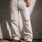 IVORY DISTRESSED BOOTCUT DENIM