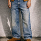 LIGHT WASH DISTRESSED BOOTCUT DENIM