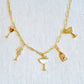 Cheers To Happiness Multi Charm Necklace