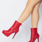 Dejang Metal Stud Embellished Faux Leather Ankle Boot