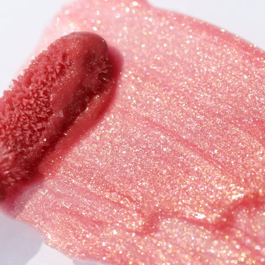 Lip swatch application of rosy pink lip gloss with gold shimmer - Instant Crush - Lucky Charm - Half Caked